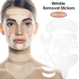 Reusable silicone facial patches applied to a woman's face, targeting forehead, eyes, cheeks, mouth, neck, and chest wrinkles. A set of 18 clear, various-shaped anti-aging wrinkle removal stickers is displayed next to her