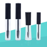 Clear plastic refillable mascara tubes with black caps and wands